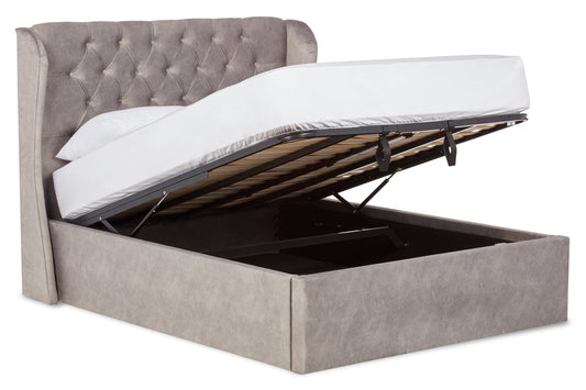 Baker Upholstered ottoman bed with winged headboard