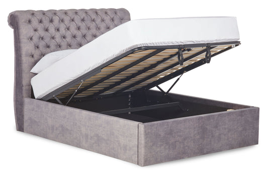 Boudica Upholstered ottoman bed with roll top headboard