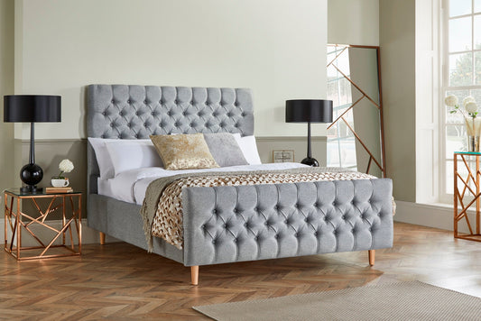 Lennon Upholstered bed with Chesterfield headboard and high footboard
