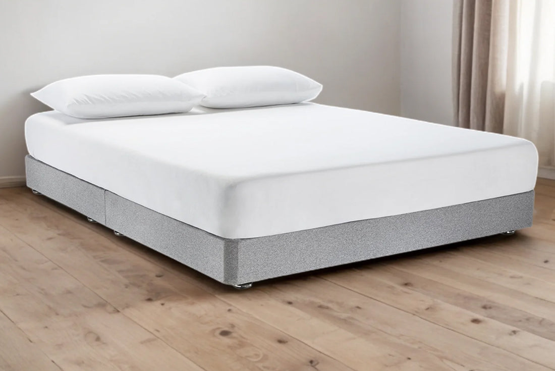 Catherine Upholstered low divan base with chrome glides - total height 19cm