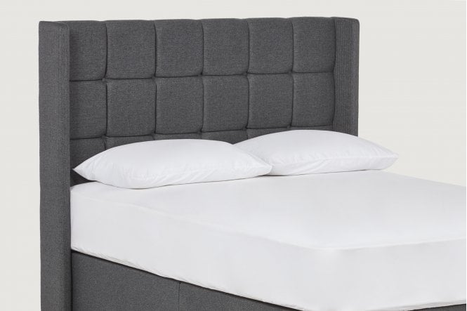 Adele Upholstered floor-standing headboard with wings